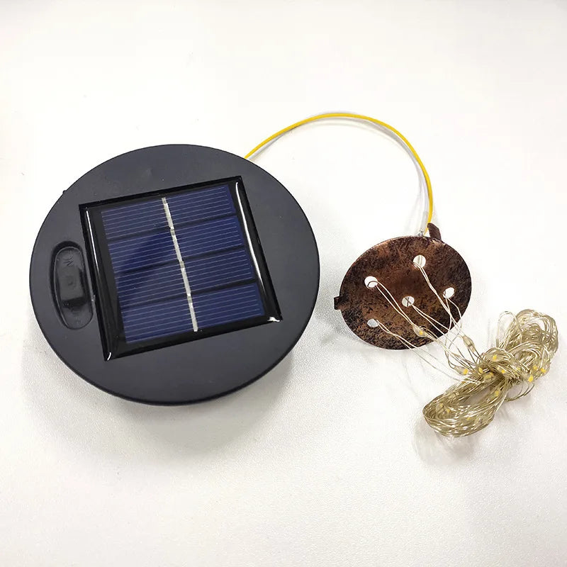 Solar Gießkanne mit Lichterkette